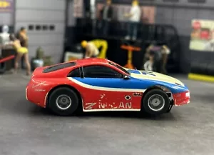 Vintage Tomy AFX HO Slot Car Nissan Z #76 Red Blue Tested & Runs - Picture 1 of 14