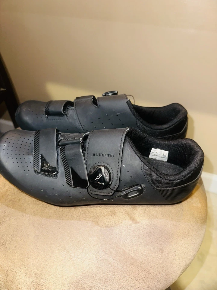 Zapatos de bicicleta Shimano NEGROS para hombre de cuero sintético con tacos y extras Foto 1 de 4