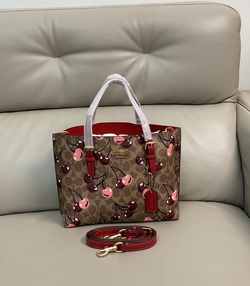 Bolso de Mano Mollie 25 en Lona Signature con Estampado de Cereza CZ772 Foto 1 de 4