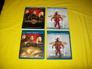 THE HUNGER GAMES MOCKINGJAY PART 1 & PART 2 BLURAY WITH SLIPCOVER  - Picture 1 of 1
