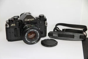 Canon A-1 Black SLR 35mm Film Camera & 50mm F/1.8 Lens. Tested. Free Warranty. - Picture 1 of 20