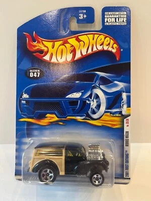 Coche diecast Morris Wagon 2001 primeras ediciones negro y tostado Hot Wheels Foto 1 de 2