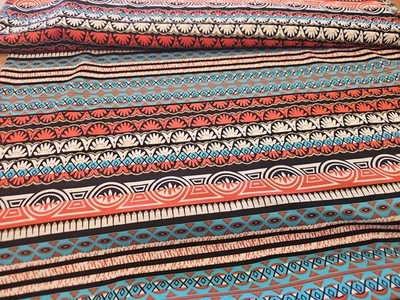 Ropa étnica a rayas de tela de punto doble por yarda  Foto 1 de 3