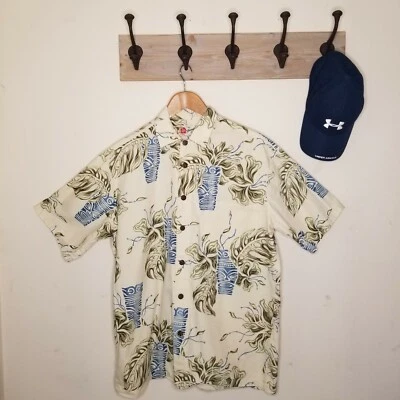 Camisa Hawaiana Hilo Hattie Para Hombres Mediana Azul Crema Tostado Floral Tribal Excelente Foto 1 de 4