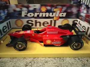 Modellino FERRARI F310 Formula 1 Shell Maisto 1:20 metallo plastica Schumacher - Foto 1 di 17