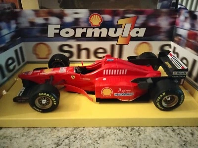 Modellino FERRARI F310 Formula 1 Shell Maisto 1:20 metallo plastica Schumacher - Immagine 1 di 4