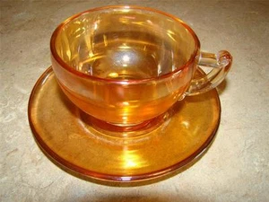 Carnival Marigold Glass 1 Cup and 1 Saucer Set Jeannette Glass @17 - Picture 1 of 1
