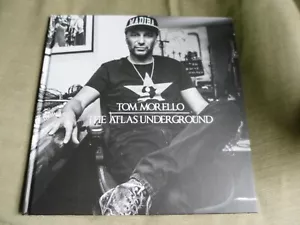 TOM MORELLO SIGNED - THE ATLAS UNDERGROUND HARDCOVER + CD - RAGE AGAINST + BONUS - Foto 1 di 12