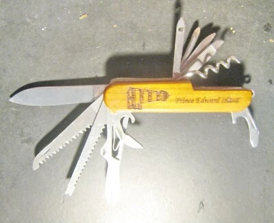11 MULTIFUNCTIONAL ORIGINAL SOLDGERS KNIFE PRINCE EDWARD IS. PERFECT CONDITION - Image 1 of 4