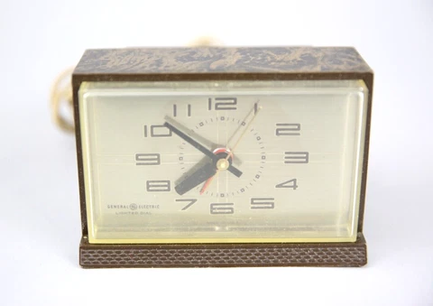 Vintage General Electric Alarm Clock Lighted Dial GE brown marble plastic Cover