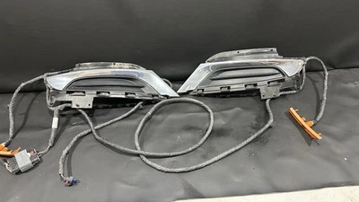 OEM 2015-2017  Chrysler 200 Front Bumper Fog Light Covers  Wiring Harness Marker - Image 1 of 4
