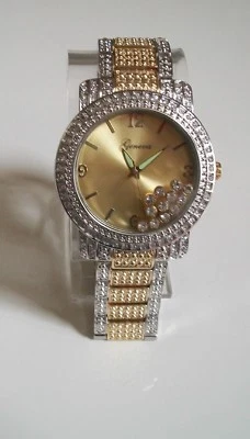 Reloj hip hop de moda con piedras flotantes informales elegantes acabado dorado y plateado para hombre Foto 1 de 4