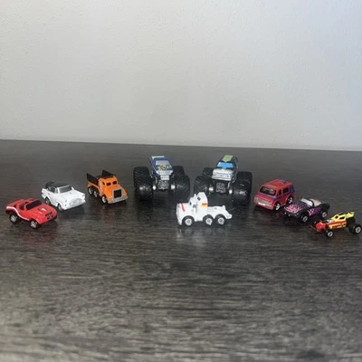 Lot of 9 Micro Machines 1980s (7 Galoob) 1990 (2 AJM/TNT) Monster Trucks - Image 1 of 4
