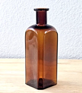 Antica base bottiglia medicinale ambra in rilievo W.T. Nuova maglia CO USA Whitall Tatum - Foto 1 di 7