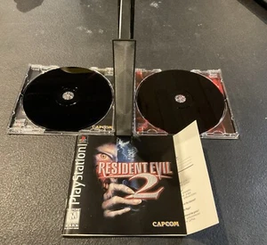 Resident Evil 2: Dual Shock PlayStation 1, 1998 beide Discs & Handbuch sind erstaunlich - Bild 1 von 6