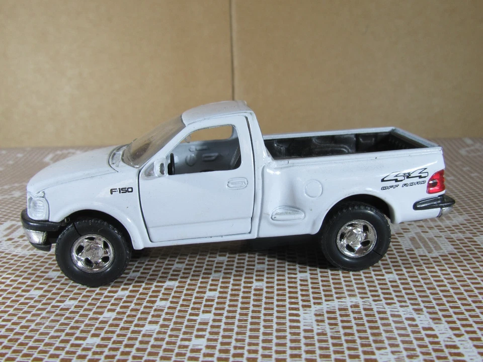 A199 Welly 9737 Ford F-150 Pick-Up Blanco Juguete A Fricción No Funcional 12 cm - Imagen 1 de 4
