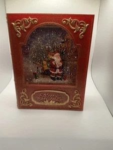 Weihnachtsbuch Wasserlaterne LED leuchtet mit Weihnachtsschlitten 8" hoch Glitzer - Bild 1 von 6