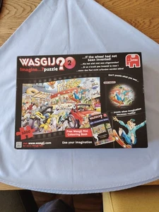 WASGIJ IMAGE PUZZLE N.2 "LA RUOTA NON ERA STATA INVENTATA" 1000 PUZZLE COMPLETO - Foto 1 di 3