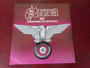 Saxon 747 STRANGERS IN THE NIGHT 1980 UK 7" P/S PLAYS MINT  MINUS HEAR - Imagen 1 de 12