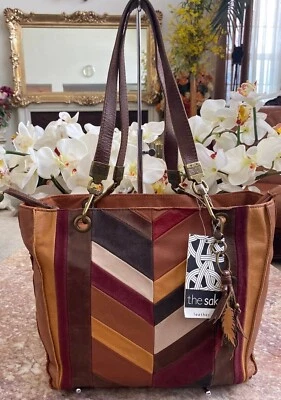 Nuevo con etiquetas Bolso de Mano Mediano The Sak Cuero Indio Tostado Multicolor Rayas Retazos, Precio de venta sugerido por el fabricante 199 USD Foto 1 de 4