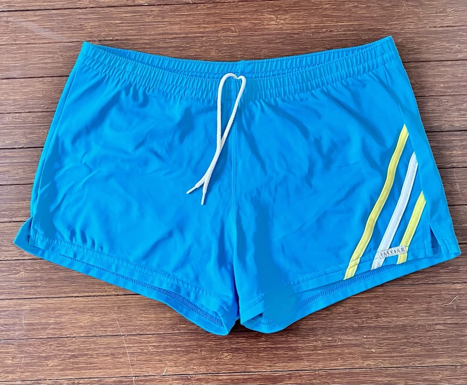 SAUVAGE RAYAS ATLÉTICAS LYCRA NADADOR TURQUESA TALLA MEDIANA Foto 1 de 4