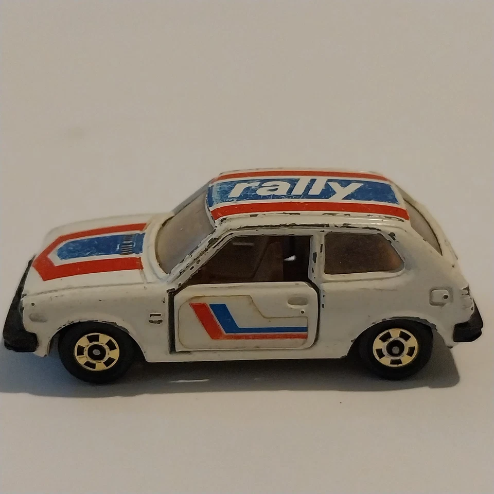 De colección Rally Tomica TOMY Honda Civic GL 1974 Nº83 Raya Roja y Azul Foto 1 de 4