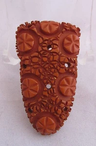 Clip de vestido de baquelita vintage pesado profundo molinete flores caramelo - Imagen 1 de 3