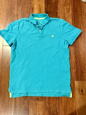 Polo para hombre American Eagle corte clásico talla mediana usado azul aguamarina Foto 1 de 4