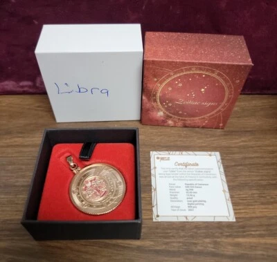 Moneda de plata Camerún 2021 500 francos signos del zodiaco con oro rosa en bisel... Libra Foto 1 de 4