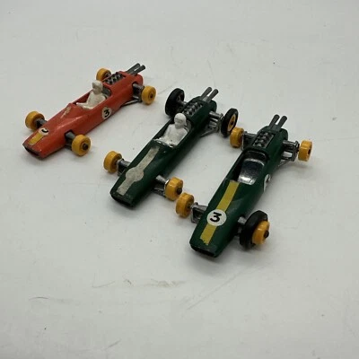 Lesney Matchbox No. 19 Lotus Orange And Green Race cars W/ Two Drivers. - Image 1 of 4