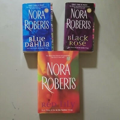 Nora Roberts In The Garden Trilogy. Blue Dahlia, Red Lily, Black Rose, 2 PB/1 HC - Image 1 of 4