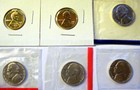 6 U.S. Coins: mixed lot. 2 gold-plated pennies and 4 Bu nickels from Mint sets