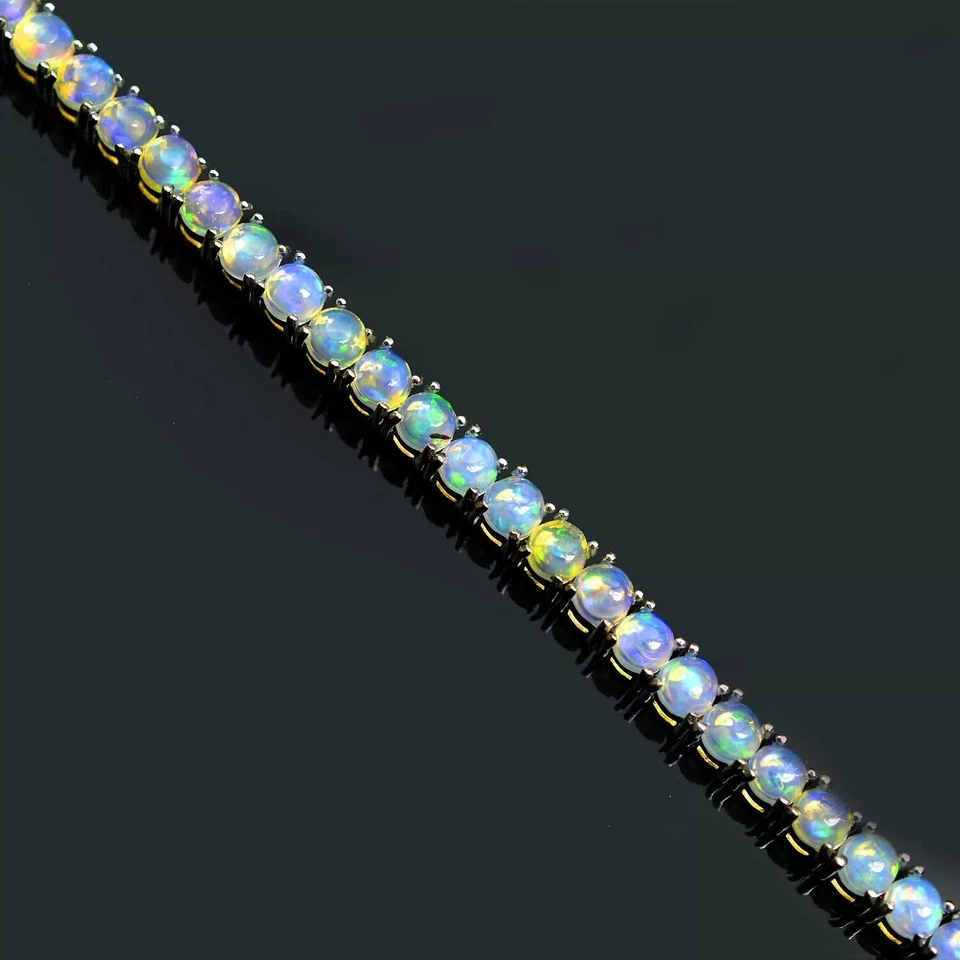 Brazalete de tenis de ópalo de fuego de corte redondo de 4 mm enchapado en oro blanco de 14K de 7" Foto 1 de 4