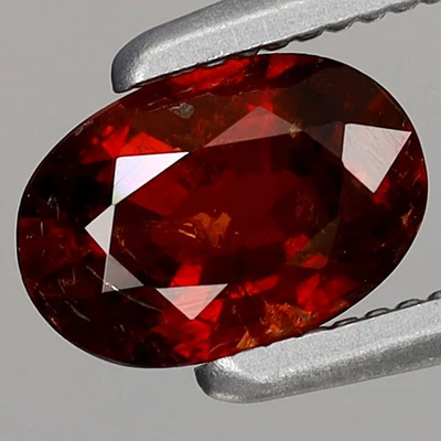 Spessartite Garnet Namibia Africa 0.74ct t.w 6.3x4.3mm Oval Natural Orangish Red - Image 1 of 4
