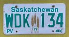 2002 Saskatchewan Canada plaque d'immatriculation #WDK 134 gerbes de gerbe de blé EXPIRÉE (1)