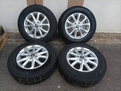 T7 Syrakus Winterräder Michelin 7T0601025 215/65R16 102H DOT23 6-7mm - Bild 1 von 4