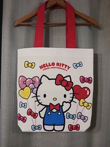 NEU Sanrio Hello Kitty 50. Jubiläum Canvas Beuteltasche Schultertasche 15" x 14 1/2" - Bild 1 von 6