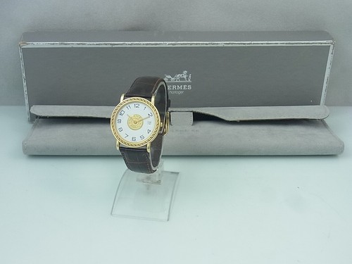 Hermès Sellier quarzo 750 oro 18K orologio donna uomo visualizzazione data Ø 32 mm scatola
