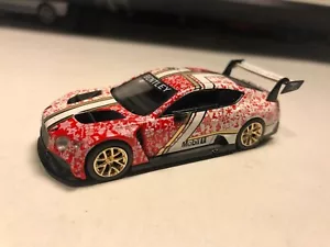 1/64 MINI GT CHRISTMAS EDITION BENTLEY CONTINENTAL GT3 RED AND WHITE PHIL DEAN - Picture 1 of 8