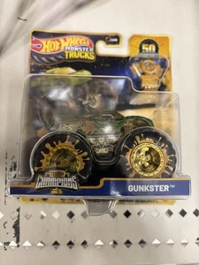 2025 Hot Wheels Monster Trucks Trophy Champions Gold Gunkster 50th Anniversary - Picture 1 of 2