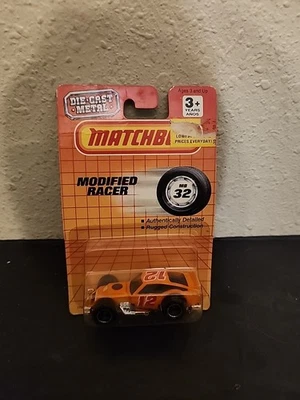 1:64 MATCHBOX 1993 MODIFIED RACER #12 ORANGE MB #32/75 NIP #1732 - Image 1 of 3