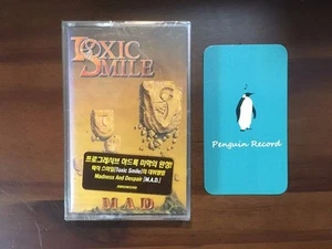 TOXIC SMILE - M.A.D. CASSETTE TAPE KOREA EDITION SEALED - Bild 1 von 3