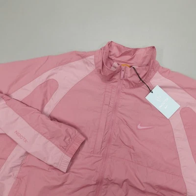 Chaqueta deportiva de nailon Nike x Nocta Northstar para hombre talla XL rosa baya FN7666-667 Foto 1 de 4