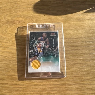 2010 Kobe Bryant PANINI THREADS TRIPLE THREAT JERSEY # 212 - Image 1 of 3