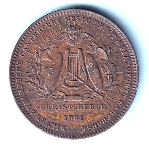 New Zealand - Token...  Milner & Thompson - 1881 1d.  Christchurch. Instruments - Picture 1 of 2
