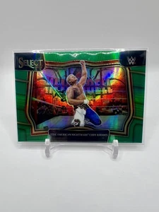 2023 Panini Select WWE Cody Rhodes Green Ringside /5 - Foto 1 di 2