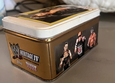 “2008 Topps WWE Heritage IV Cards + Tin – Undertaker, Edge, CM Punk, HBK” - Image 1 of 4
