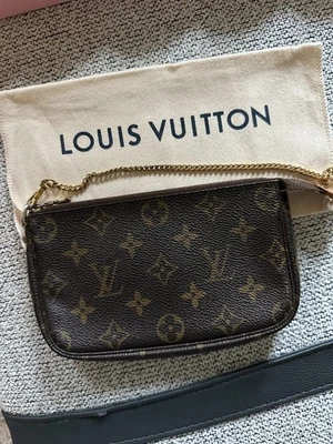 Louis Vuitton Monogram Mini Pochette Authentic w/COA and Dustbag - Image 1 of 4