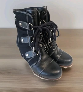 Botas informales Sorel Joan Of Arctic Wedge Mid X Celebration negras para mujer 7 EE. UU. USADAS EN EXCELENTE ESTADO - Imagen 1 de 8