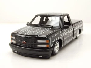 Chevrolet 454 SS Pick Up 1993 schwarz weiß Modellauto 1:24 Maisto - Bild 1 von 9